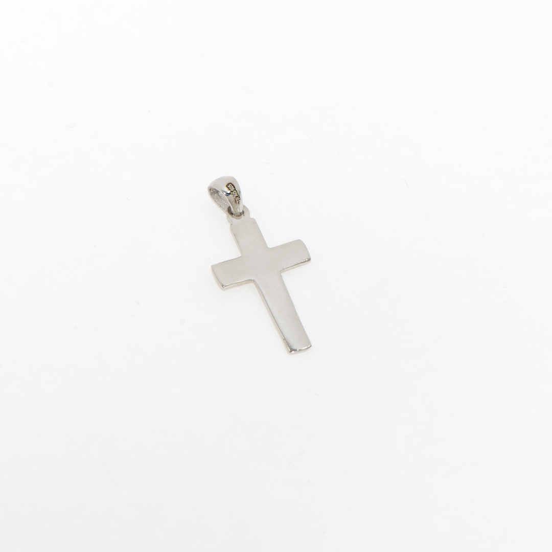 Dieser klassische 925 Silber Kreuz Anhänger überzeugt durch sein zeitloses Design und die hochwertige Verarbeitung. Ohne Verzierungen und in schlichter Form bietet dieser Silberanhänger eine elegante und stilvolle Ergänzung zu jedem Outfit. Ideal für den täglichen Gebrauch oder als bedeutungsvolles Geschenk für besondere Anlässe.